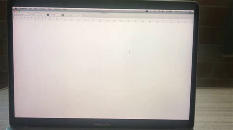 If I apply pressure with my hand to the bottom of the laptop underneath the area of the left option key, it magically goes away. . Black lines across macbook pro screen